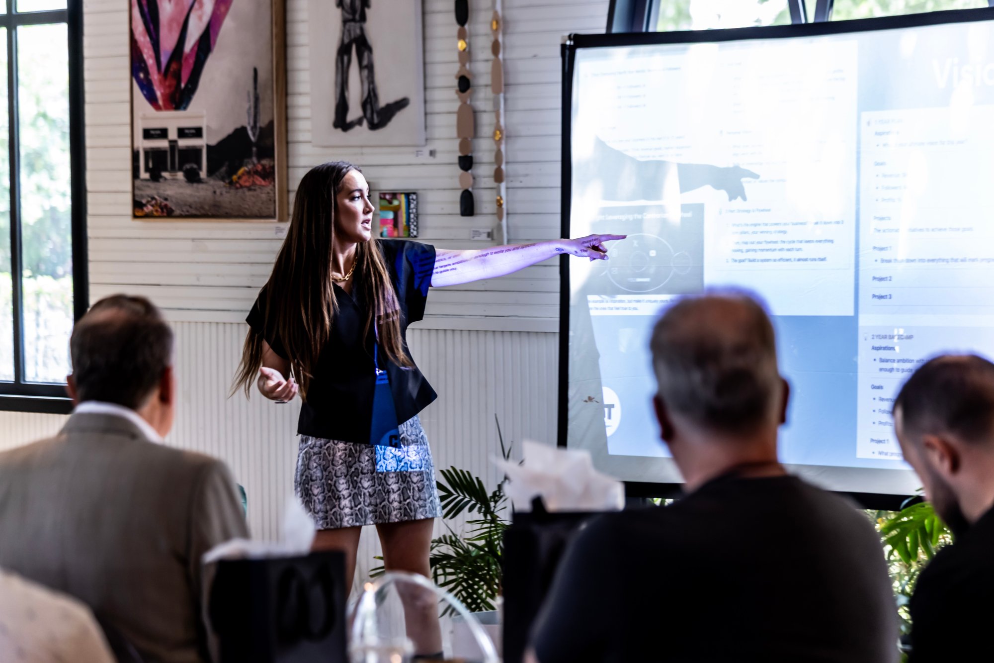 codie pointing at a presentation